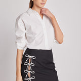Renee Bow Cut Out Mini Skirt