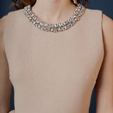 Jewel Trim Neck Peplum Knit Top