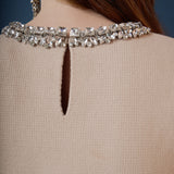 Jewel Trim Neck Peplum Knit Top