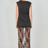 Back view of black tailored vest lace maxi dress featuring a sleeveless tailored vest back and a sheer floral lace skirt.