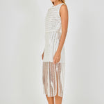 Side view of off-white sleeveless sequin crop top and matching sequin stripe midi skirt featuring a straight side profile and sheer mesh overlay.
