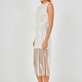 Side view of off-white sleeveless sequin crop top and matching sequin stripe midi skirt featuring a straight side profile and sheer mesh overlay.