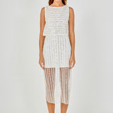 Full-length front view of an off-white sequin stripe mesh midi skirt with vertical sequin embroidery and an elastic waist, paired with a matching sequin crop top.