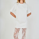 White mix media maxi dress featuring a short-sleeve boxy t-shirt bodice and a sheer floral lace skirt.