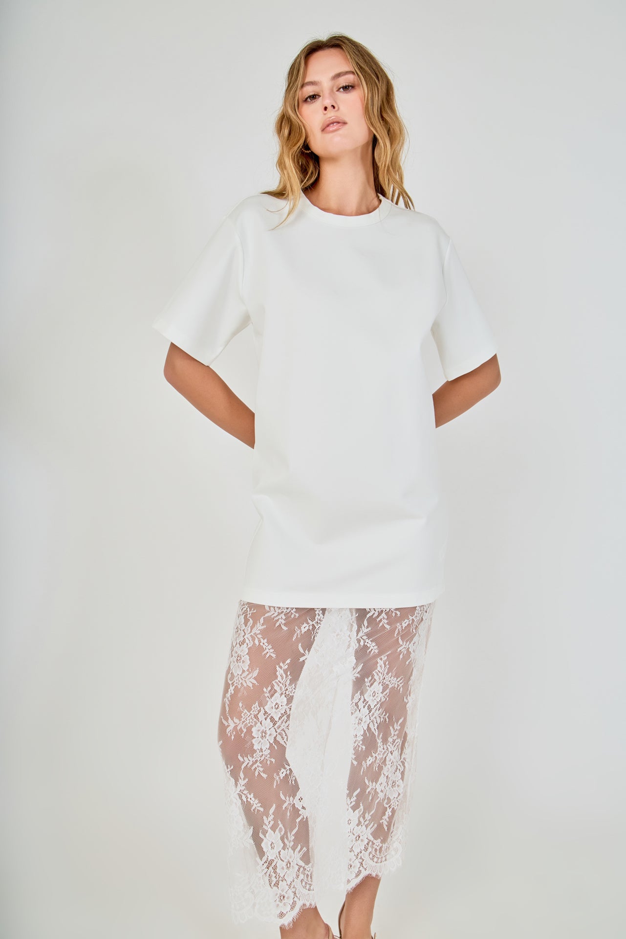White mix media maxi dress featuring a short-sleeve boxy t-shirt bodice and a sheer floral lace skirt.