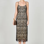 Black beaded lace midi dress featuring thin spaghetti straps, a scoop neckline, nude inner lining, and a scalloped hem with a side slit.
