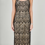 Close-up view of black beaded lace midi dress featuring thin spaghetti straps, a scoop neckline, and a nude inner lining.