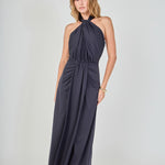 Navy draped halter maxi dress featuring a gathered halter neckline, front waist draping, and a floor-length skirt.