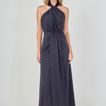 Navy draped halter maxi dress featuring a gathered halter neckline, front waist draping, and a floor-length skirt.