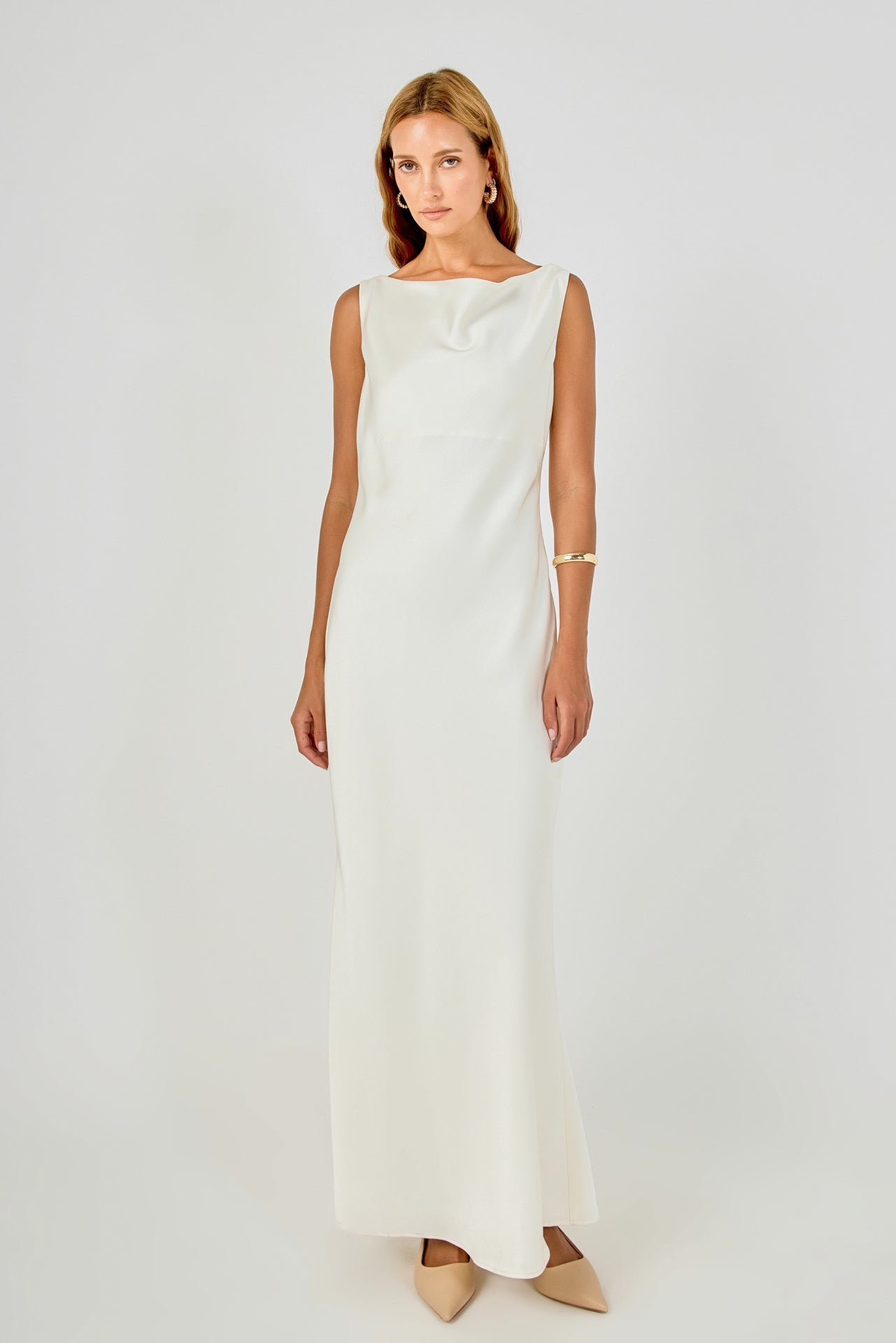 Full-length straight-on front view of an ivory sleeveless cowl-neck maxi dress showing the complete column silhouette.