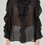 Close-up view of black sheer ruffled blouse highlighting the tie-neck bow, delicate front ruffles, and lightweight sheer chiffon fabric.