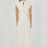 Straight-on rear view of cream sleeveless knit maxi dress featuring a high crew neckline with a subtle keyhole neck cutout.