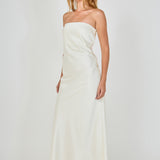 Side profile view of an ivory strapless satin maxi dress showing the sleek body-skimming fit and clean lateral seam.