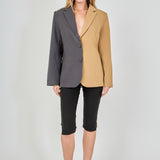 Tan and charcoal grey woven polyester blend straight-fit blazer featuring a half-pinstripe two-tone design, notch lapels, long sleeves, and center front button closures.