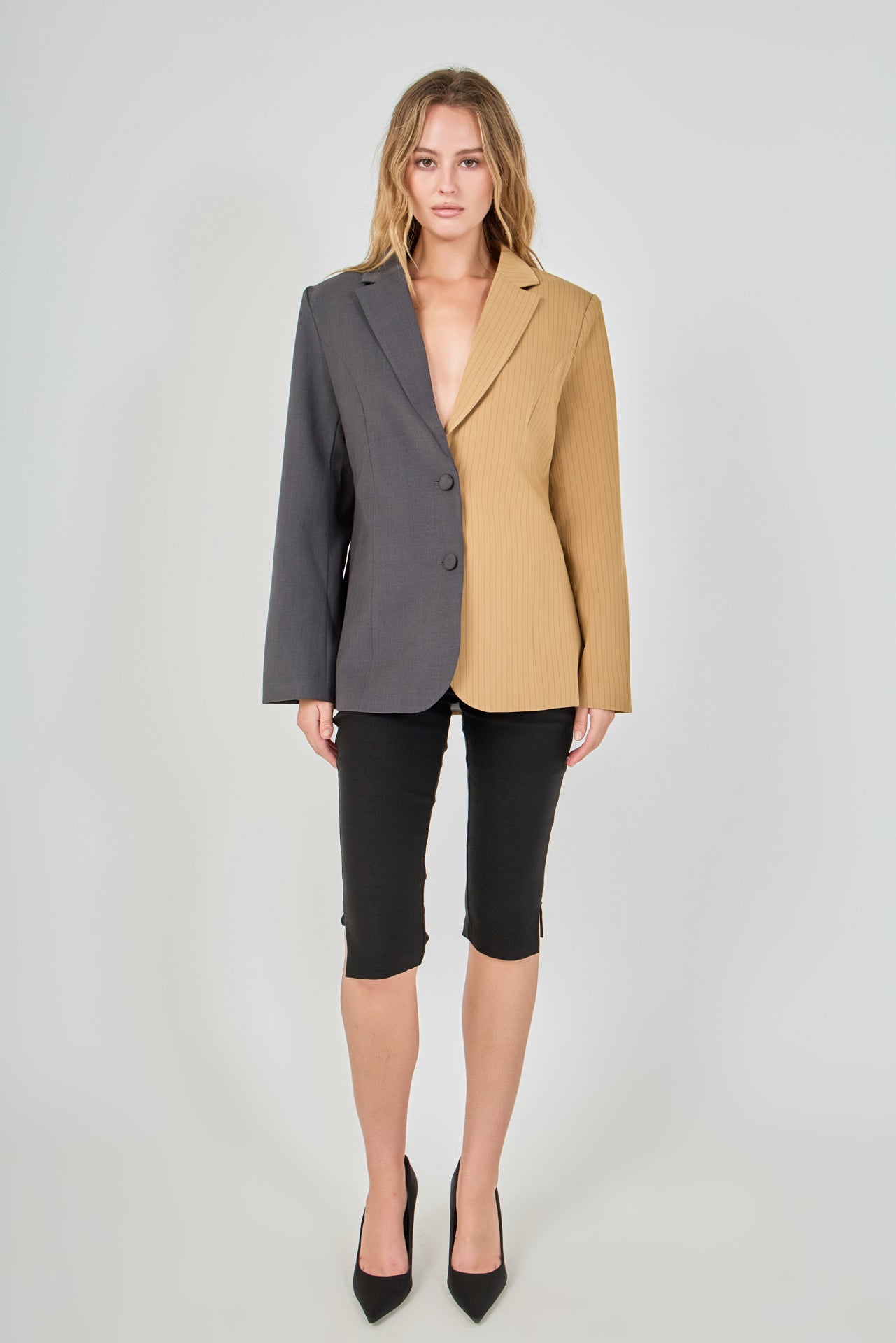 Tan and charcoal grey woven polyester blend straight-fit blazer featuring a half-pinstripe two-tone design, notch lapels, long sleeves, and center front button closures.