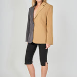 Tan and charcoal grey woven polyester blend straight-fit blazer featuring a half-pinstripe two-tone design, notch lapels, long sleeves, and center front button closures.