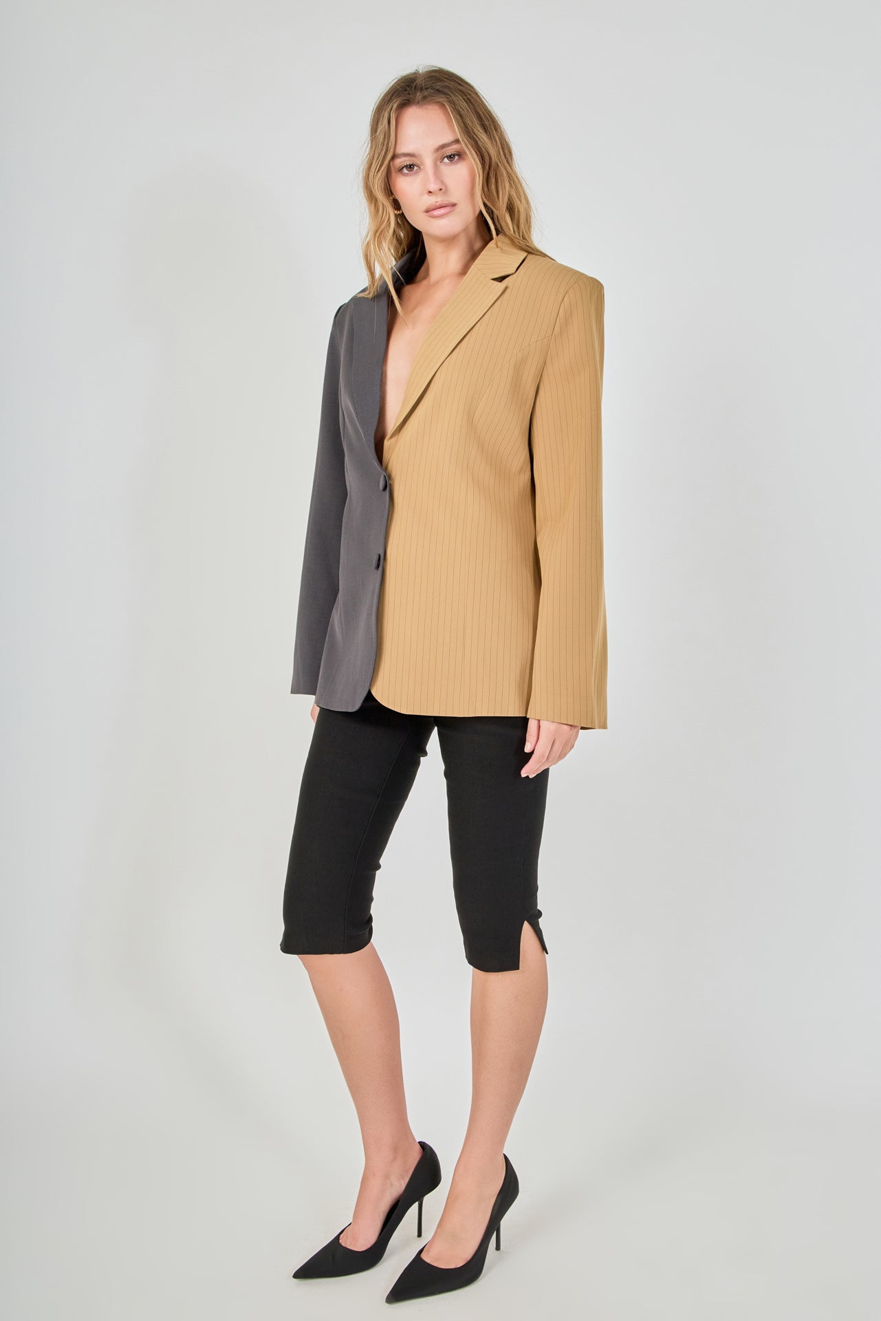 Tan and charcoal grey woven polyester blend straight-fit blazer featuring a half-pinstripe two-tone design, notch lapels, long sleeves, and center front button closures.