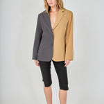 Tan and charcoal grey woven polyester blend straight-fit blazer featuring a half-pinstripe two-tone design, notch lapels, long sleeves, and center front button closures.