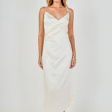 Full-length front view of a champagne satin wrap midi dress showcasing the wrap neckline, ruched waist detail, and straight skirt silhouette.