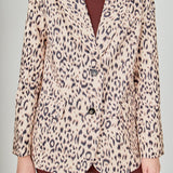 Beige multi leopard print woven oversized blazer featuring notched lapels, long sleeves with shoulder pads, front flap pockets, and a single-breasted button closure.