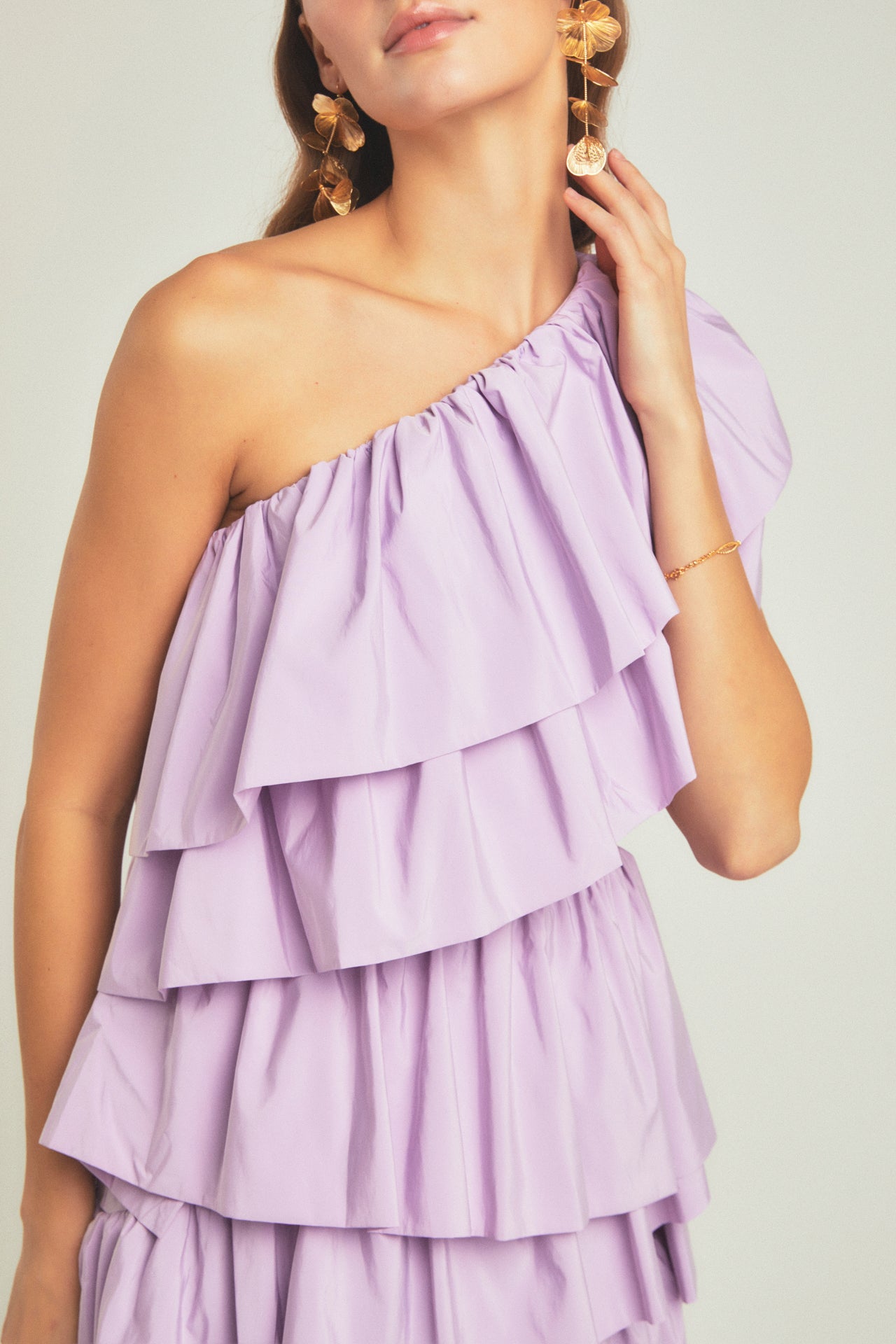 Discover our One-Shoulder Ruffled Mini Dress from our Spring Capsule: SS Wardrobe '24 Editorial