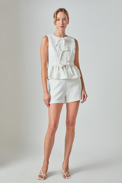 Charlotte Sleeveless Peplum Top