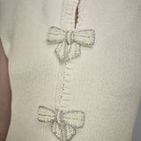 Sleeveless Mini Knit Dress With Bow Accents