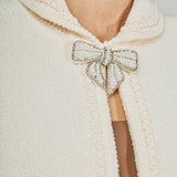 Cardigan Featuring Braided Trim and Bow Accents